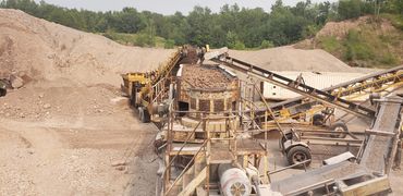 Burton Excavating Inc 49783 sand, stone, gravel site prep sewer repair crushing screening aggregate