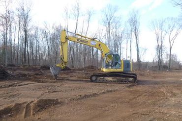 Burton Excavating Inc 49783 site prep, water/sewer/septic system, landscape materials 15 Mile Rd pit