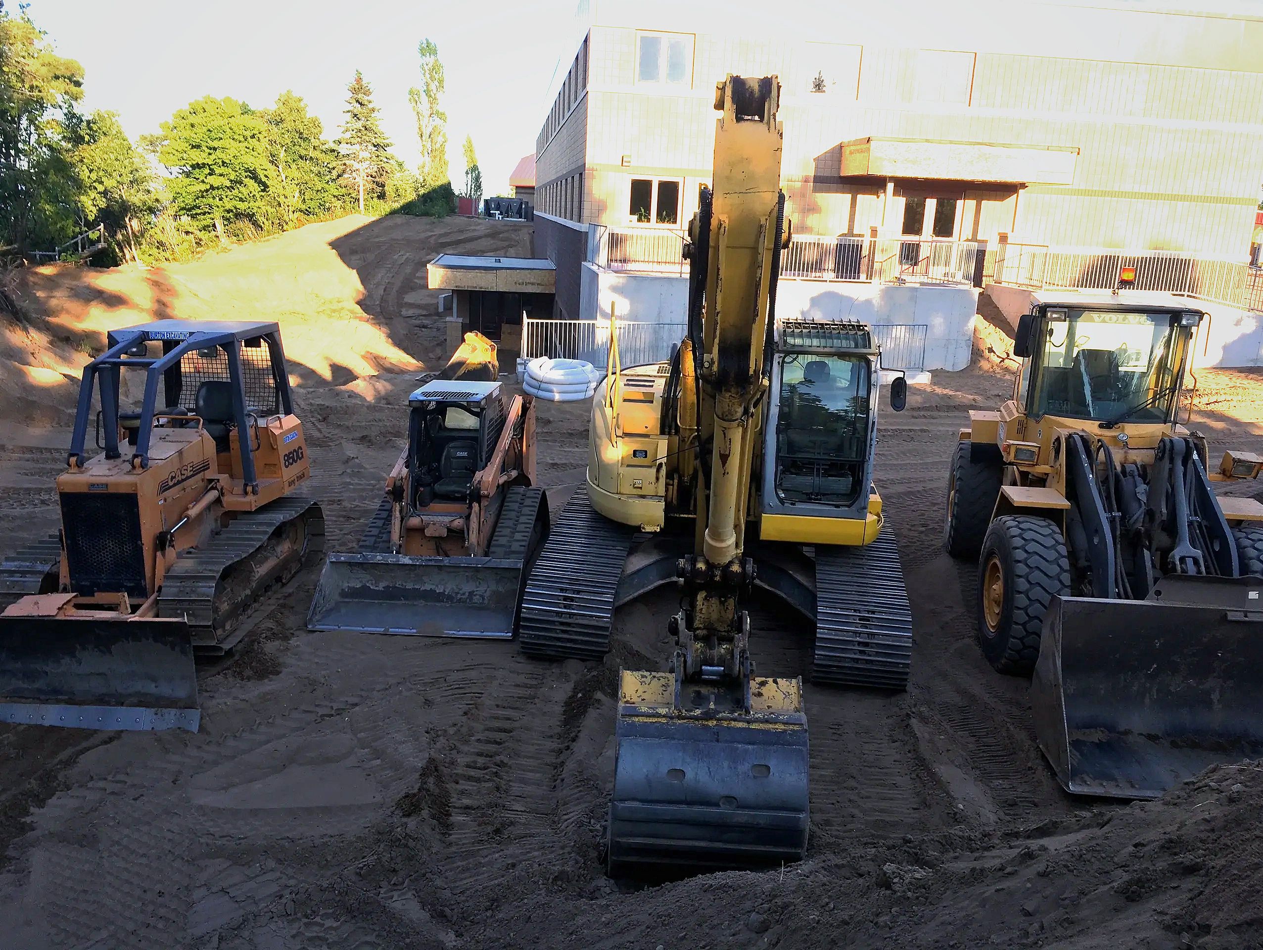 Burton Excavating, Inc - 49783 site prep, water/sewer/septic system, landscape materials