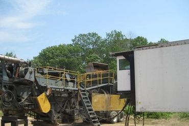 Burton Excavating Inc 49783 site prep, water/sewer/septic system, landscape materials 15 Mile Rd pit