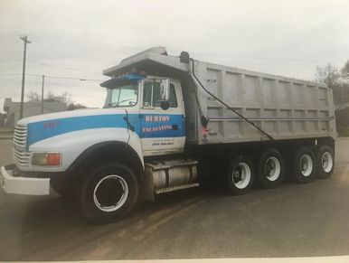 Burton Excavating, Inc. 49783 used equipment for sale site prep septic systems, water lines material