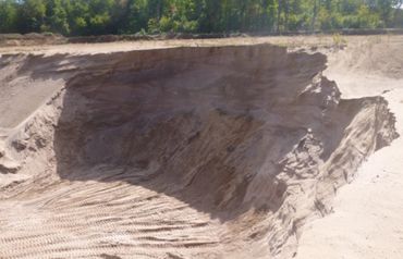 Burton Excavating Inc 49783 site prep, water/sewer/septic system, landscape materials 15 Mile Rd pit