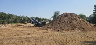 Burton Excavating Inc 49783 sand stone gravel site prep sewer repair land clearing waste removal