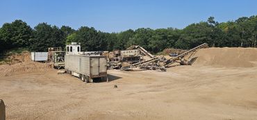 Burton Excavating Inc 49783 sand stone gravel site prep sewer repair land clearing waste removal