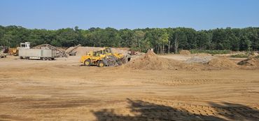 Burton Excavating Inc 49783 sand stone gravel site prep sewer repair land clearing waste removal
