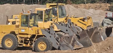 Burton Excavating Inc 49783 sand stone gravel site prep sewer repair land clearing waste removal