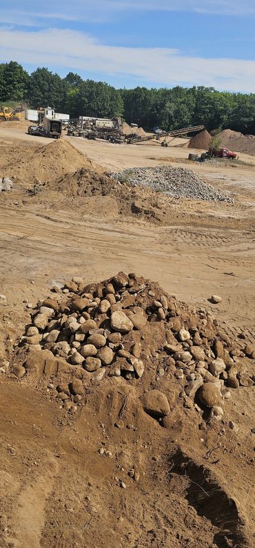 Burton Excavating Inc 49783 sand stone gravel site prep sewer repair land clearing waste removal