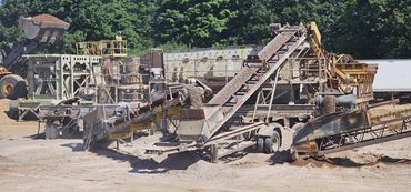 Burton Excavating Inc 49783 sand stone gravel site prep sewer repair land clearing waste removal