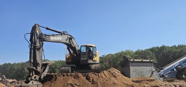 Burton Excavating Inc 49783 sand stone gravel site prep sewer repair land clearing waste removal