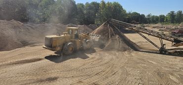 Burton Excavating Inc 49783 sand stone gravel site prep sewer repair land clearing waste removal