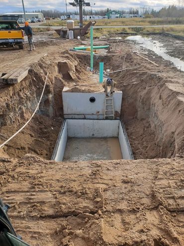 Burton Excavating, Inc - 49783 site prep, water/sewer/septic system, landscape materials. Drainfield