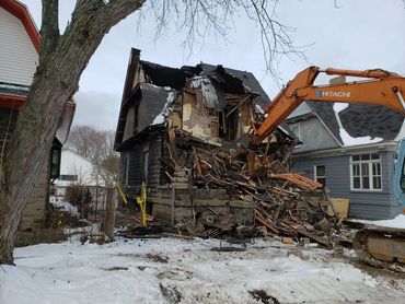 Burton Excavating, Inc - 49783 site prep, water/sewer/septic system, landscape materials. Demo