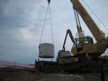 Burton Excavating, Inc - 49783 site prep, water/sewer/septic system, landscape materials