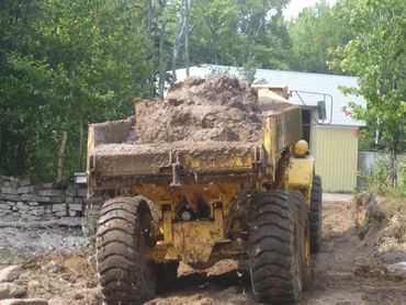 Burton Excavating, Inc - 49783 site prep, water/sewer/septic system, landscape materials