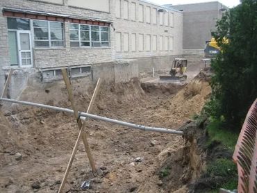 Burton Excavating, Inc - 49783 site prep, water/sewer/septic system, landscape materials