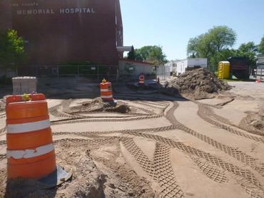 Burton Excavating, Inc - 49783 site prep, water/sewer/septic system, landscape materials. Hospital