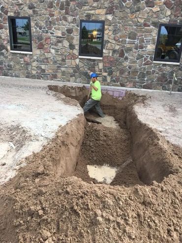 Burton Excavating, Inc - 49783 site prep, water/sewer/septic system, landscape materials