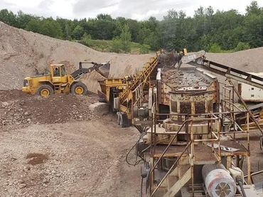 Burton Excavating Inc 49783 sand, stone, gravel site prep sewer repair crushing screening aggregate