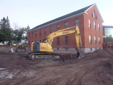 Burton Excavating, Inc - 49783 site prep, water/sewer/septic system, landscape materials