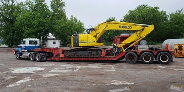 Burton Excavating, Inc - 49783 site prep, water/sewer/septic system, landscape materials