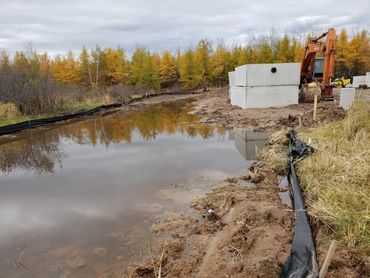 Burton Excavating, Inc - 49783 site prep, water/sewer/septic system, landscape materials