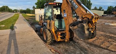 Burton Excavating, Inc - 49783 site prep, water/sewer/septic system, landscape materials