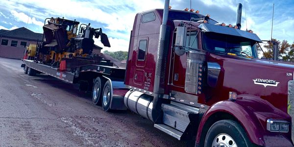 railroad MOW equipment moving ballast regulator