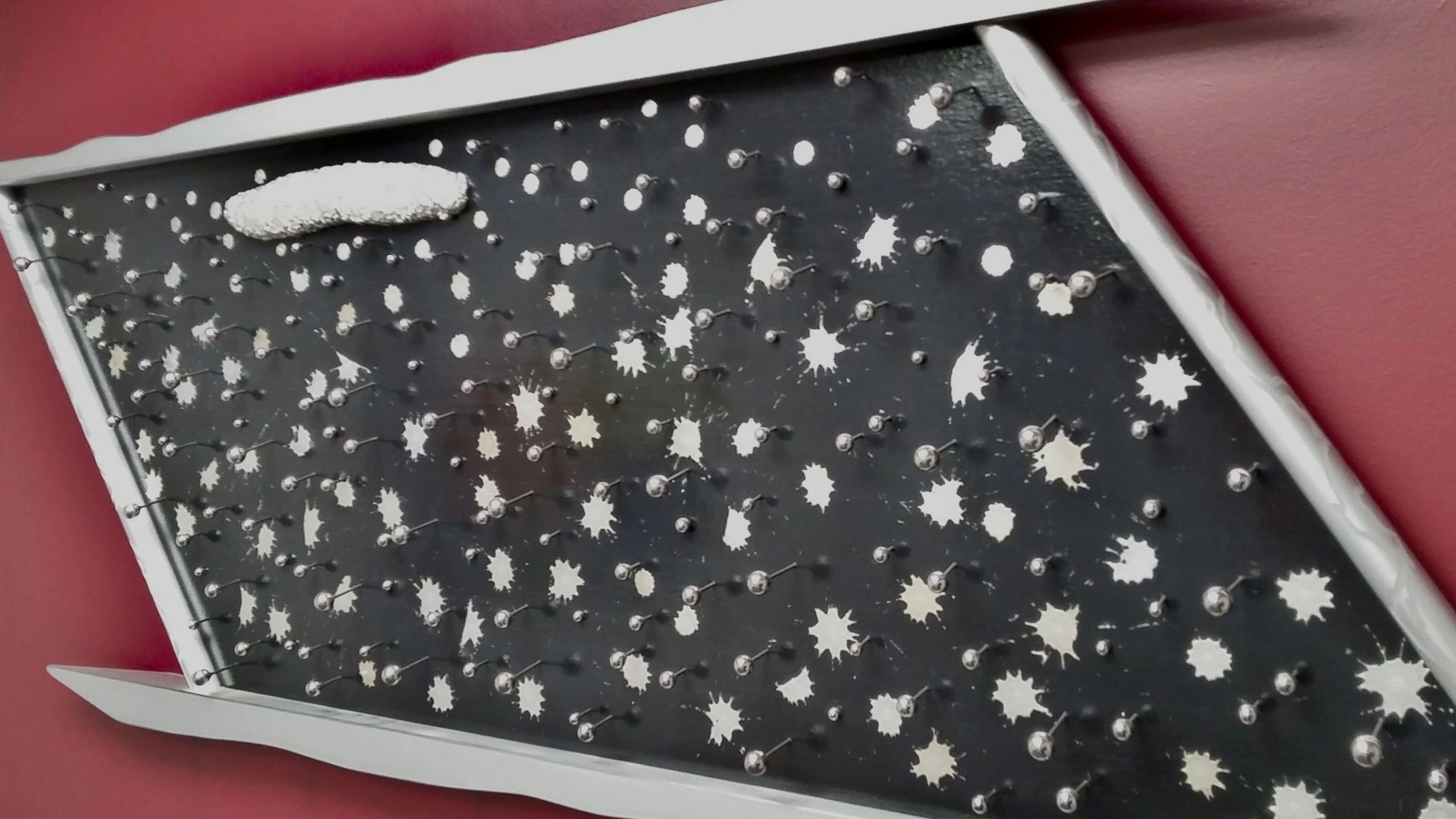 "Mercury Rain" chrome, silver and aluminum wall sculpture by S. St-pierre, 9 feet wide, x 26" x 3"