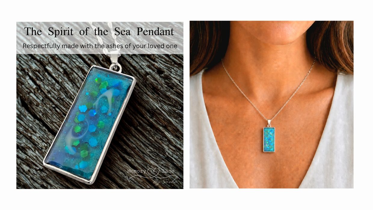 Rectangular blue pendant with green sparkles worn on a silver chain.
