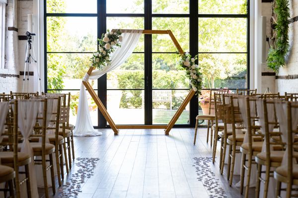 Wedding ceremony set up at Lillibrooke Manor.