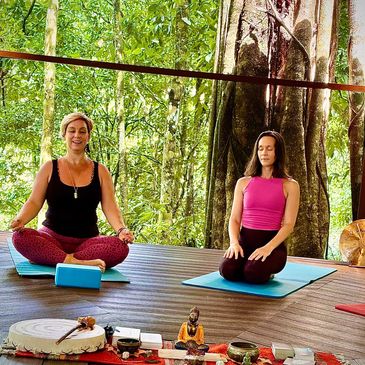 Lead yoga instructors meditating in nature at luxury all-inclusive 200 hour YTT in Quepos Costa Rica