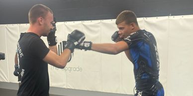 Adults training MMA striking and defense at Lions Pride Boxing & MMA in Bunnell, FL.