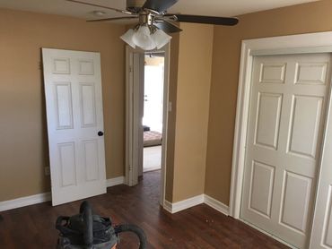 Interior painting, door installation, crooning fan installation, wood flooring installation.