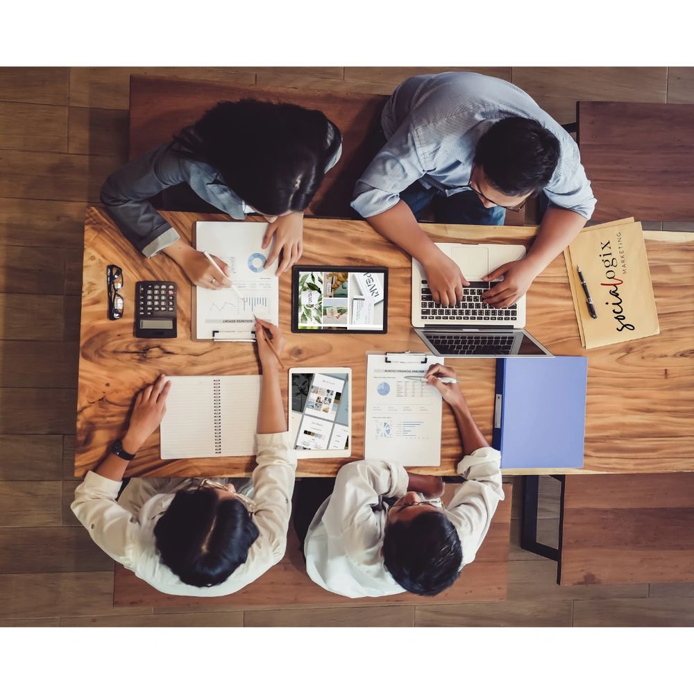 Socialogix Marketing team collaborating on a digital strategy in Orlando office.