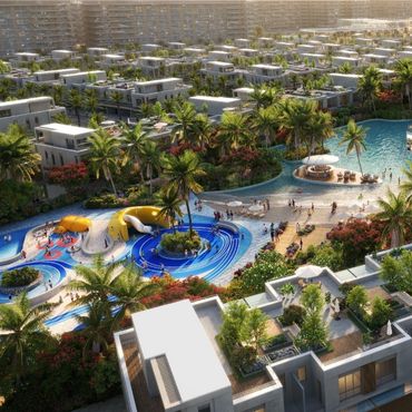 Luxurious residential area with pools, slides, and lush greenery under golden sunlight.