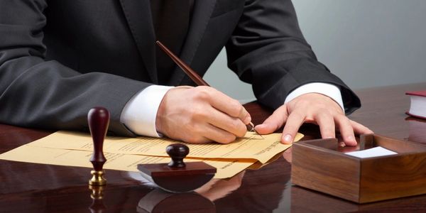 A man Signing Notary Paper