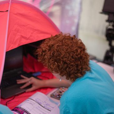 young women operating mission operation console
