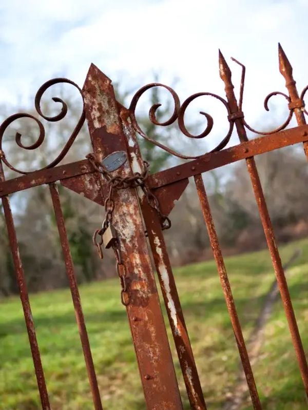An old rusty iron gate.