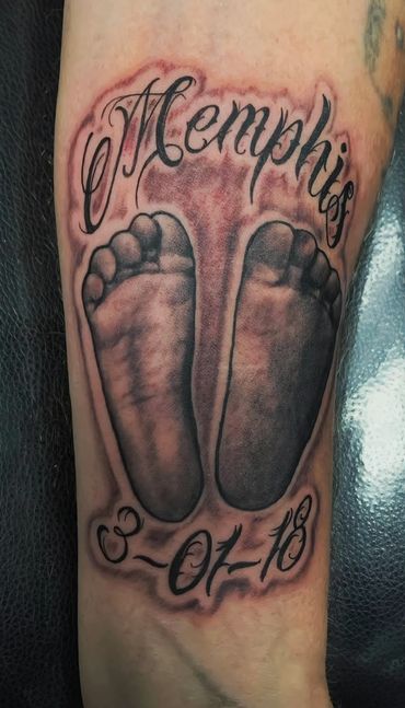 Baby feet print with script tattoo