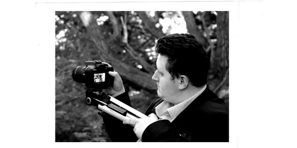 Our CEO behind the camera on a video shoot.