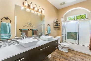 Client wanting the flooring replaced in the house and the vanity changed to a floating one.