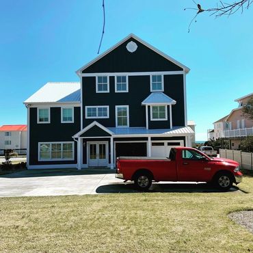 Three story home with clean windows.