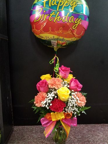 1/2 DZ ROSES WITH CARNATIONS..45.00
BALLOONS..6.00