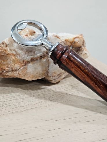 Chrome bottle opener with cocobolo handle