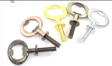 Five metallic wing nuts in different colors.