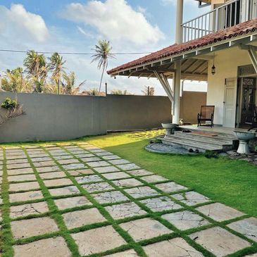 The patio side of the beach house