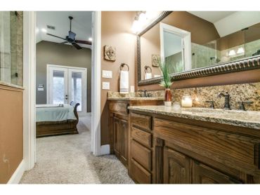 Custom red oak cabinetry with granite countertops