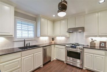 Custom kitchen remodel. Custom cabinetry, subway tile, granite countertops, hardwood floors