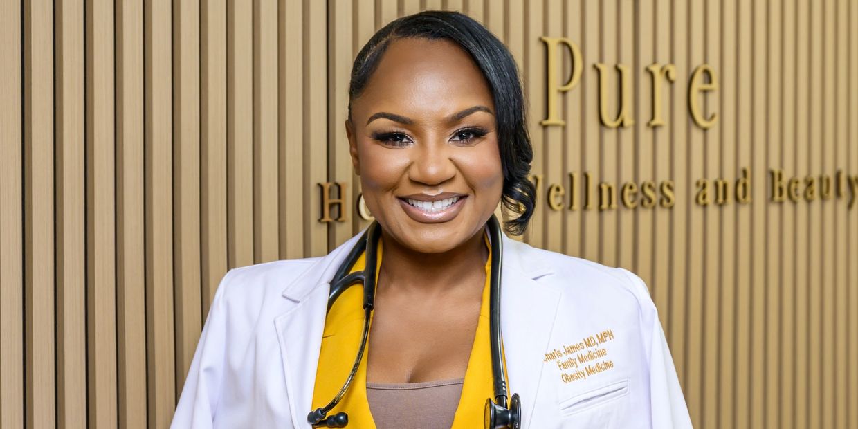 Dr James in white coat