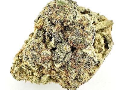 Close-up of a dense, frosty cannabis bud with visible trichomes and orange hairs.